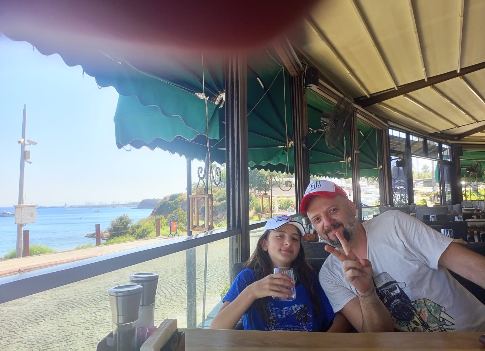 Family at a seaside restaurant